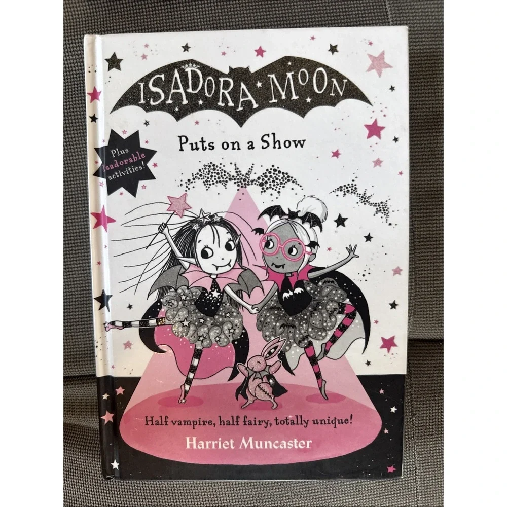 Isadora Moon Puts on a Show by Muncaster, Harriet Hardback Book The Fast Free